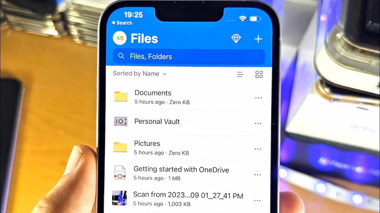 How do I add OneDrive to the Files app?