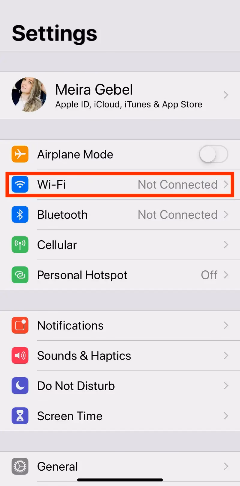 How do I enable Wi-Fi on my iPhone?