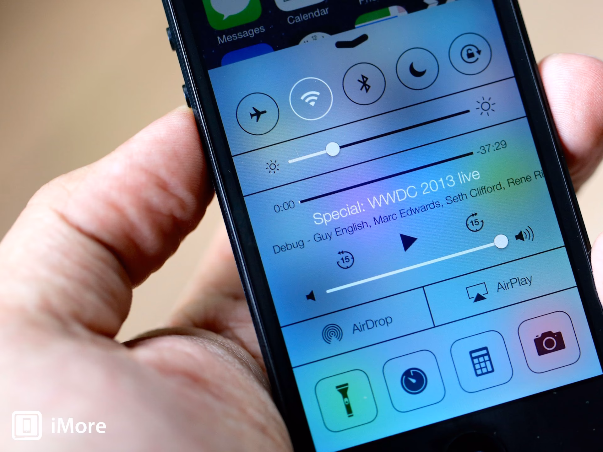 How do I Access Control Center on my iPhone X?