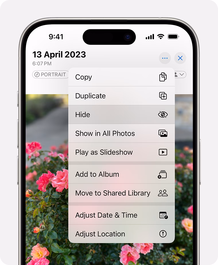 How do I remove a hidden album from my Photos app?