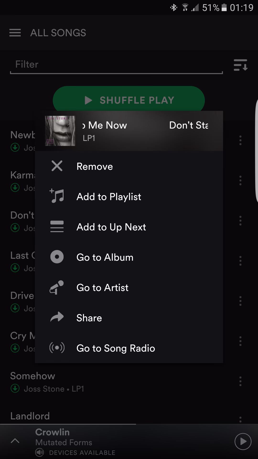 What happens if I delete downloaded songs from Spotify?