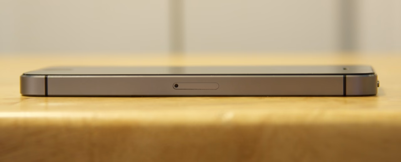 What does the side button do on an iPhone?