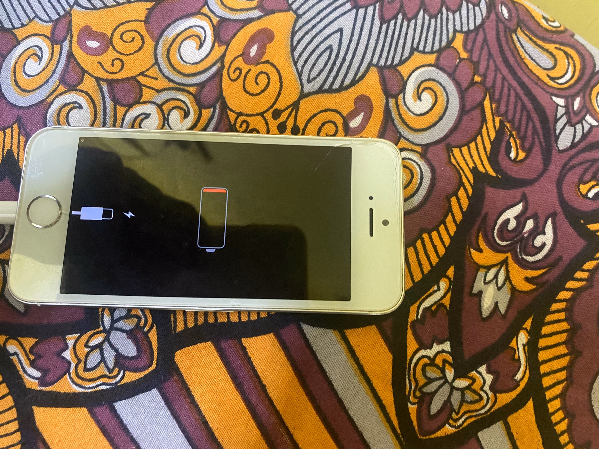 How do I fix a flashing Apple logo on my iPhone?