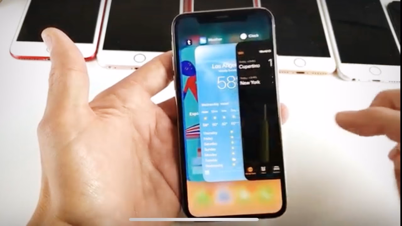 How do I manage open windows on my iPhone?
