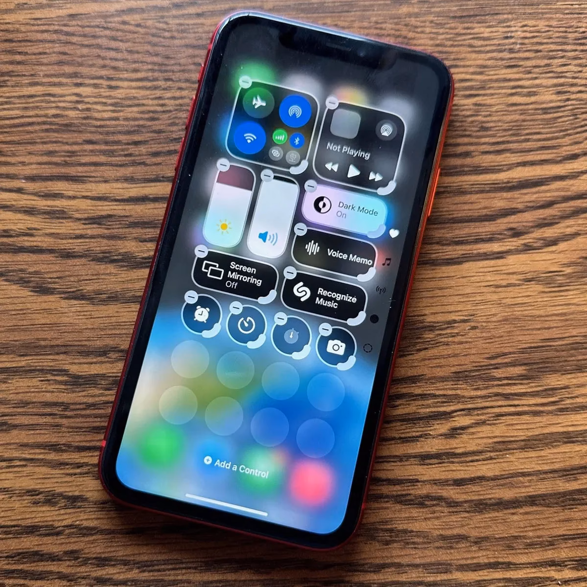Where is the control center icon on iOS 7?