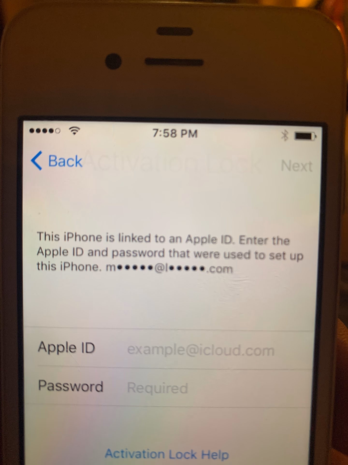 What does “this device is already associated with an Apple ID” mean?